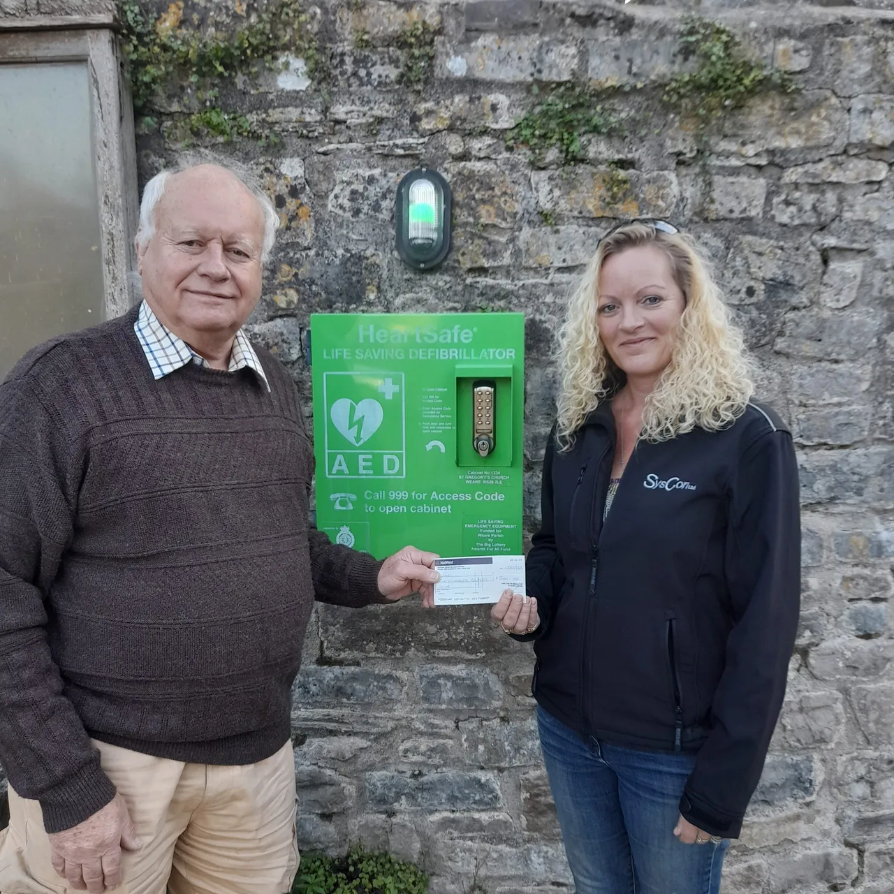 Trust chairman Phil Davies with SysCon director Heidi Nicholson